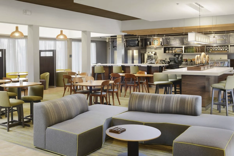sonesta select dallas central expressway lounge lobby.webp