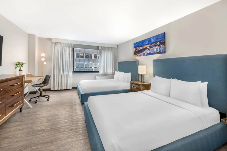 The Quincy an Ascend Collection Hotel kamer.webp